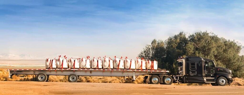 Pallets of soda ash loaded on a flatbed trailer