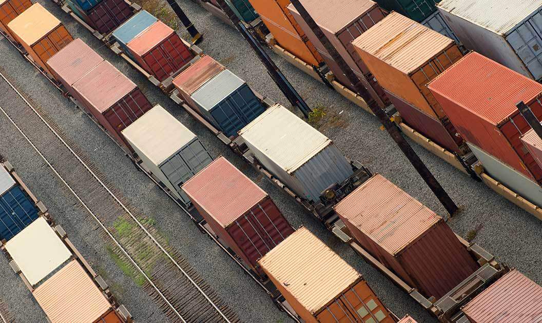 overhead view of railcars with storage containers