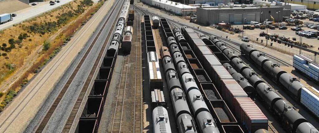 overhead view of tanker cars at a rail yard